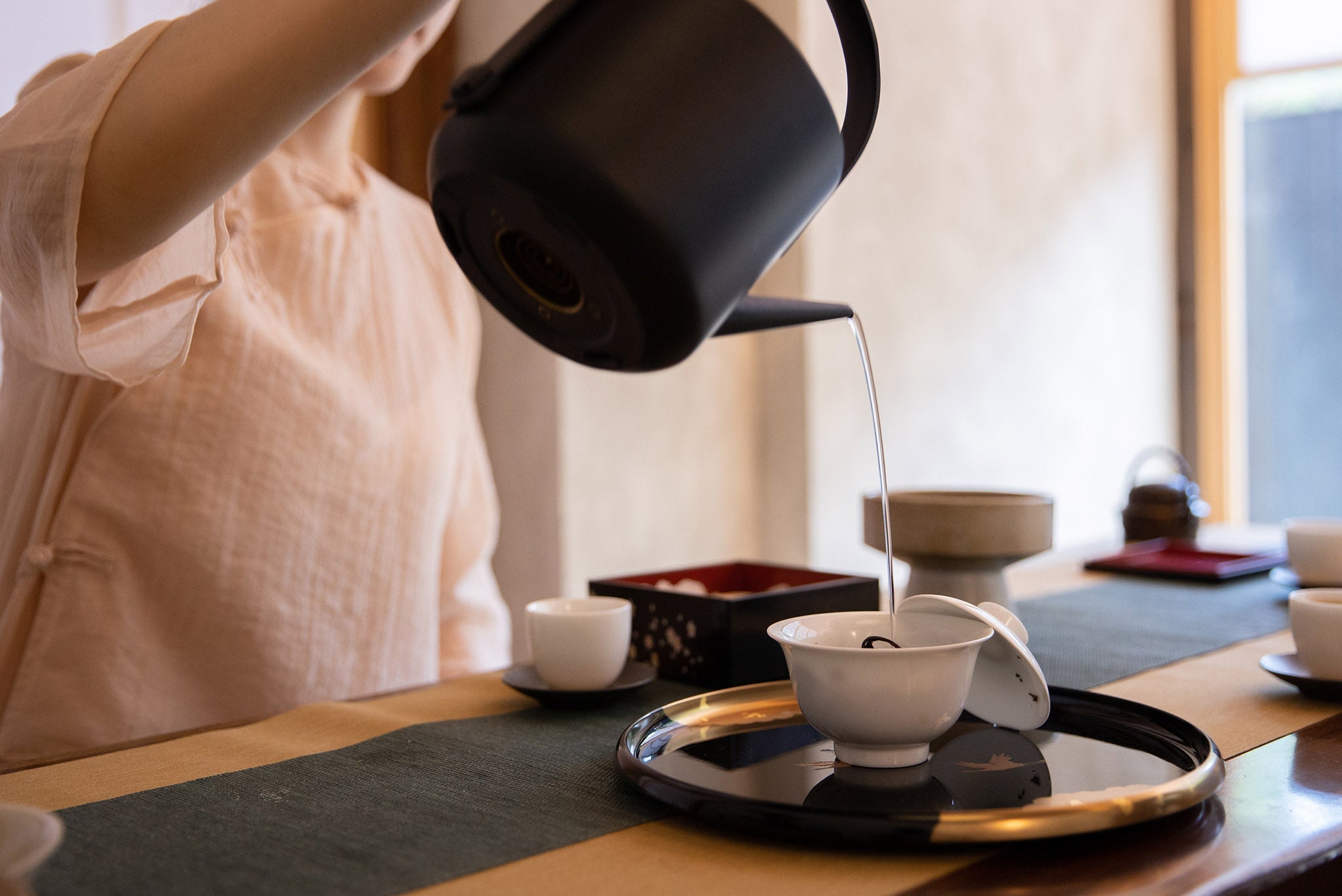 The Essence of Water in Tea Brewing