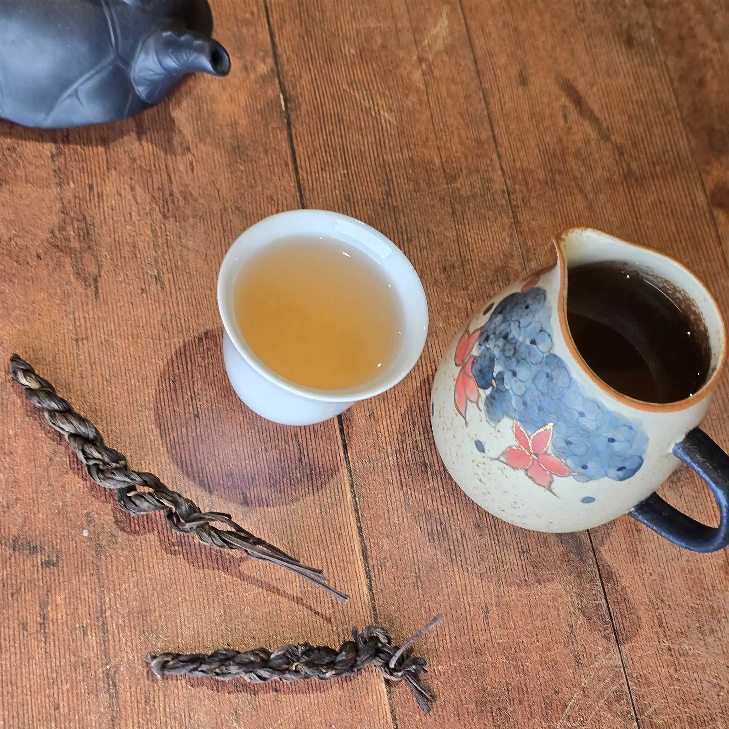 Handmade Da Xue Shan Bianzi Cha, Snowy Mountain Braided Raw Puer (Charcoal Smoked)
